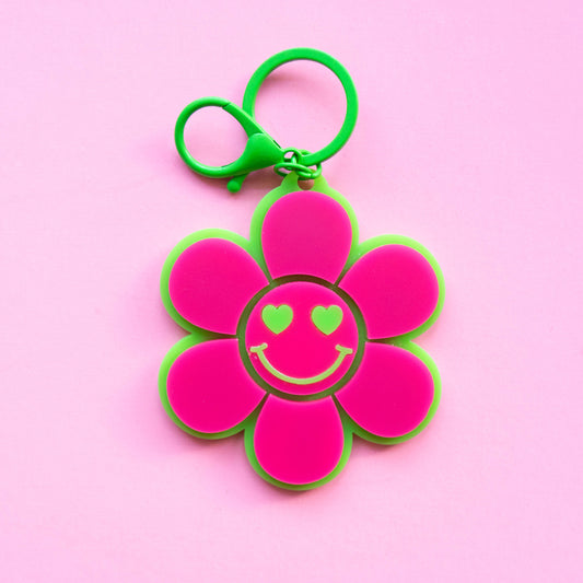 Bright pink and green flower keychain with smiley face and heart eyes — Happy Bloom NFC keychain by Curio & Co